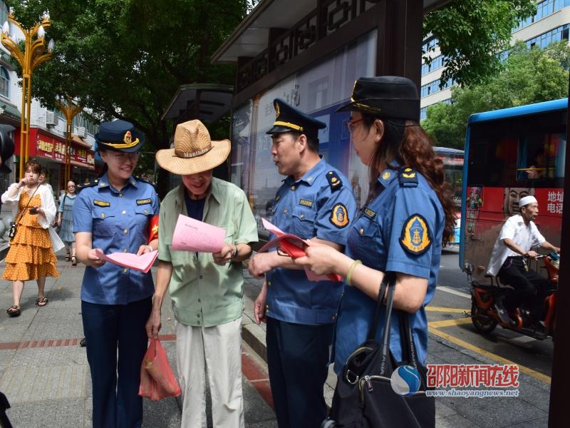 邵阳市交通执法支队开展“护航高考”文明交通志愿服务活动(图1)